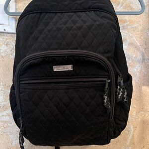 Vera Bradley backpack with leopard print interior (partial).